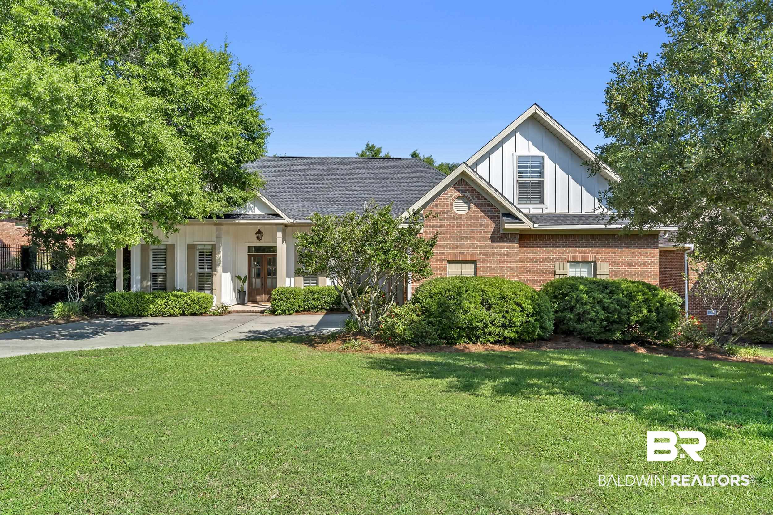 8137 Pine Run Daphne, AL 36527 - Photo 1 of 67 Traditional architecture featuring brick and vertical siding