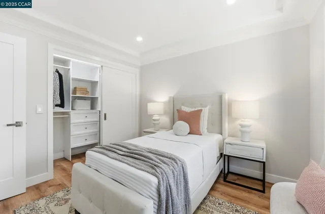 a bedroom with a bed and a view of bathroom