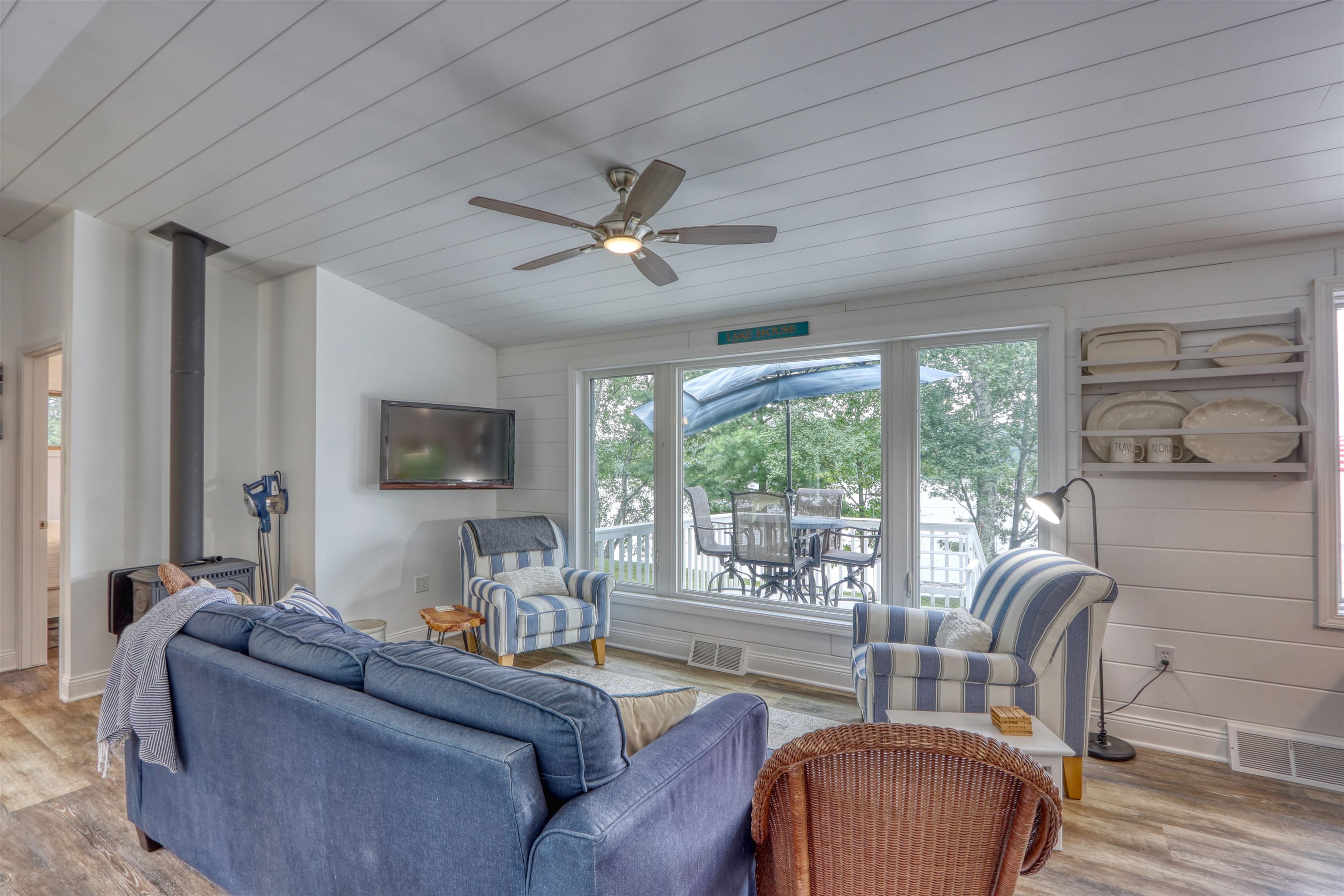 7144 Malm Road Winter, WI 54896 - Photo 31 of 58 Living room featuring light wood-style flooring, a ceiling fan, and wood ceiling