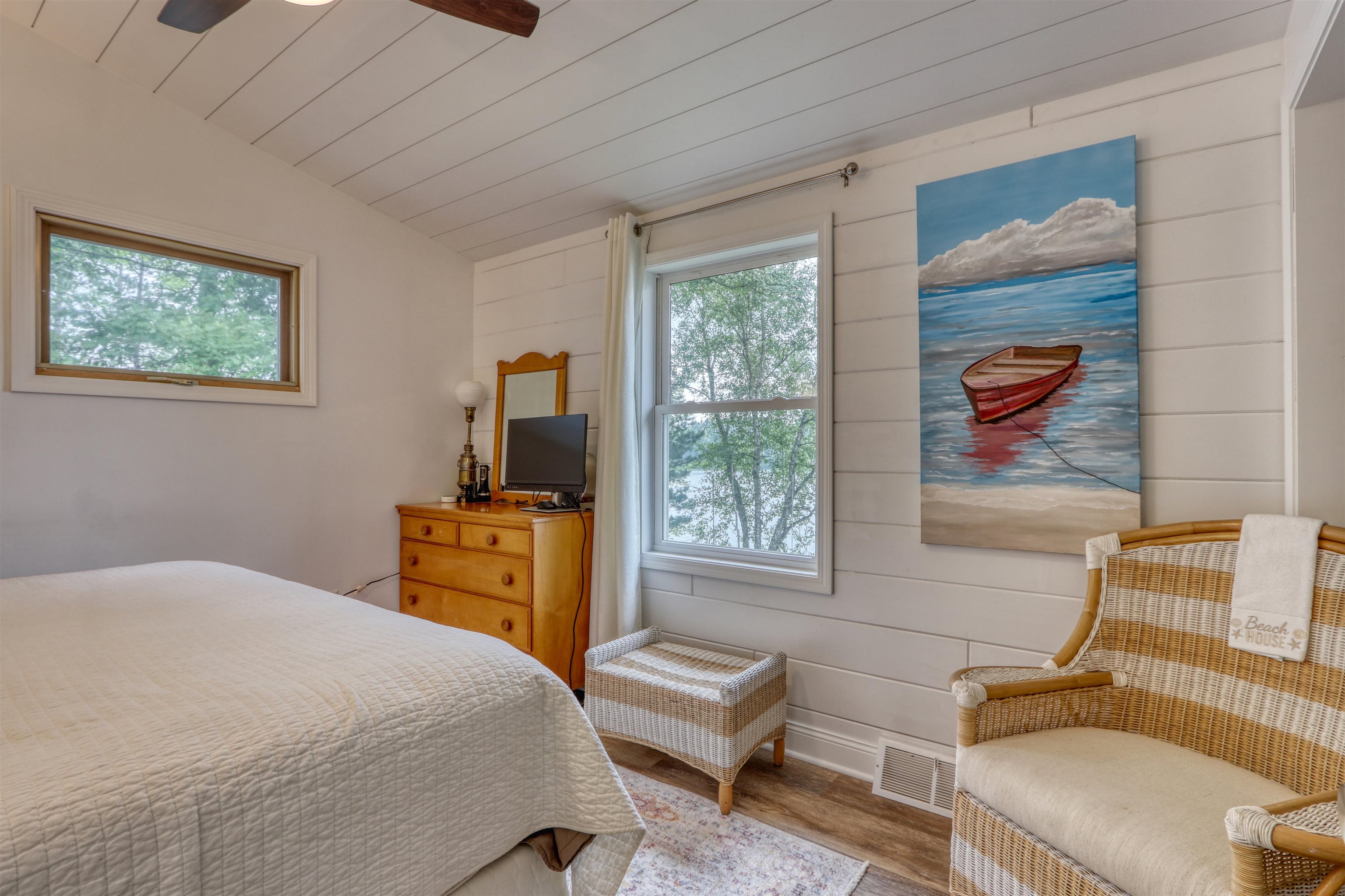 7144 Malm Road Winter, WI 54896 - Photo 34 of 58 Bedroom featuring wood finished floors, lofted ceiling, wood ceiling, and wooden walls