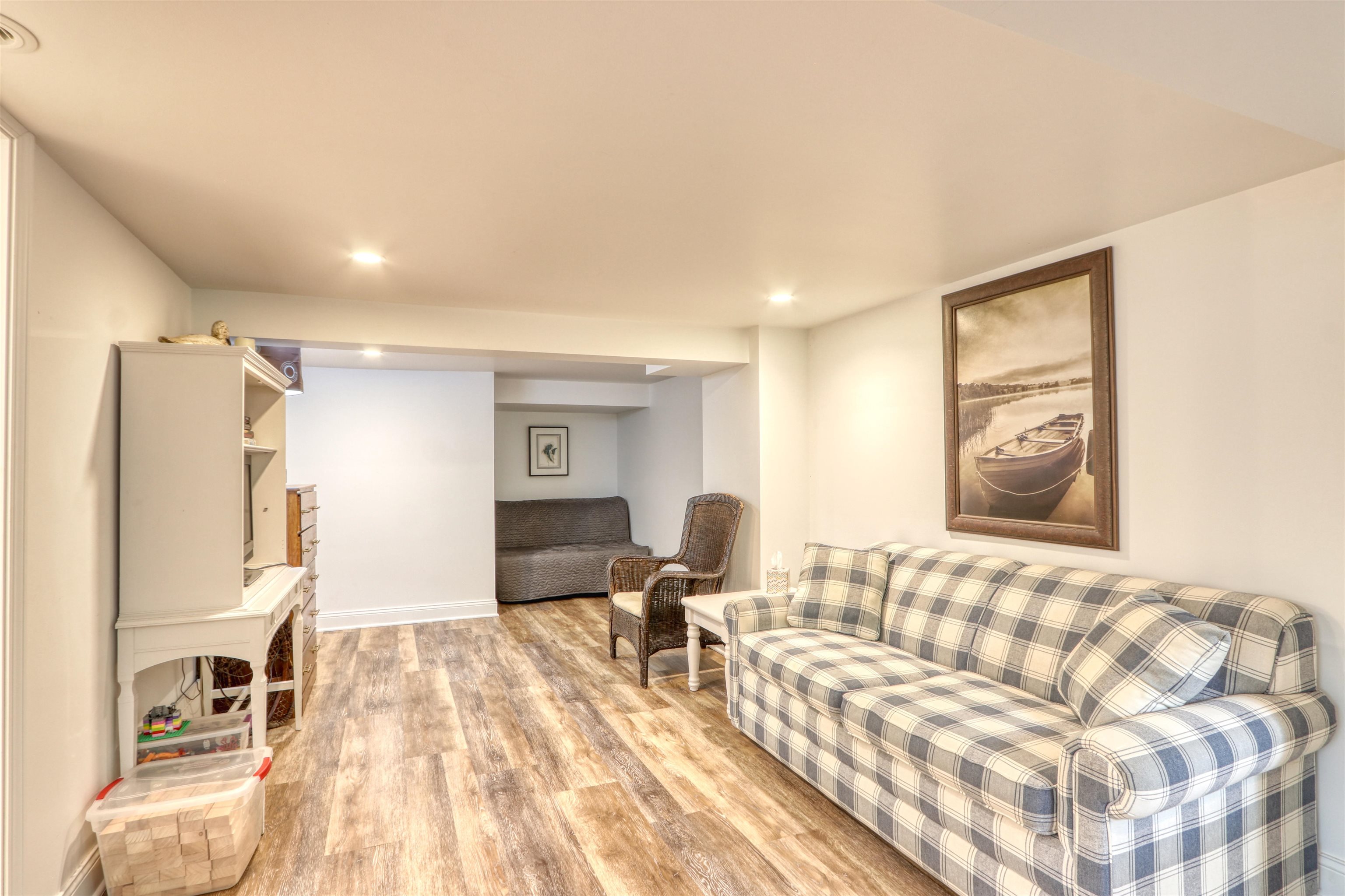 7144 Malm Road Winter, WI 54896 - Photo 37 of 58 Living area featuring light wood finished floors and recessed lighting