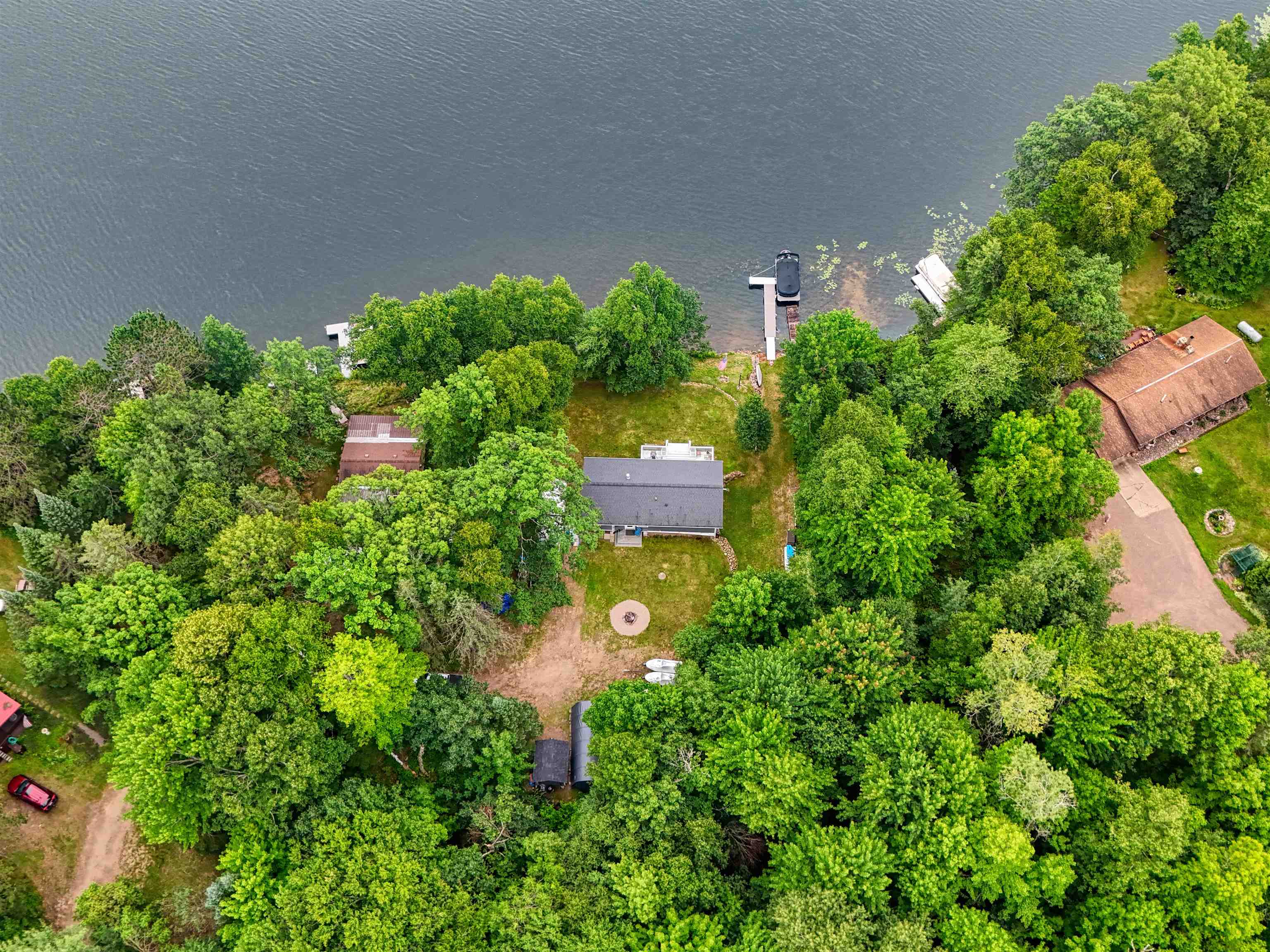 7144 Malm Road Winter, WI 54896 - Photo 45 of 58 Aerial view of property and surrounding area featuring a nearby body of water