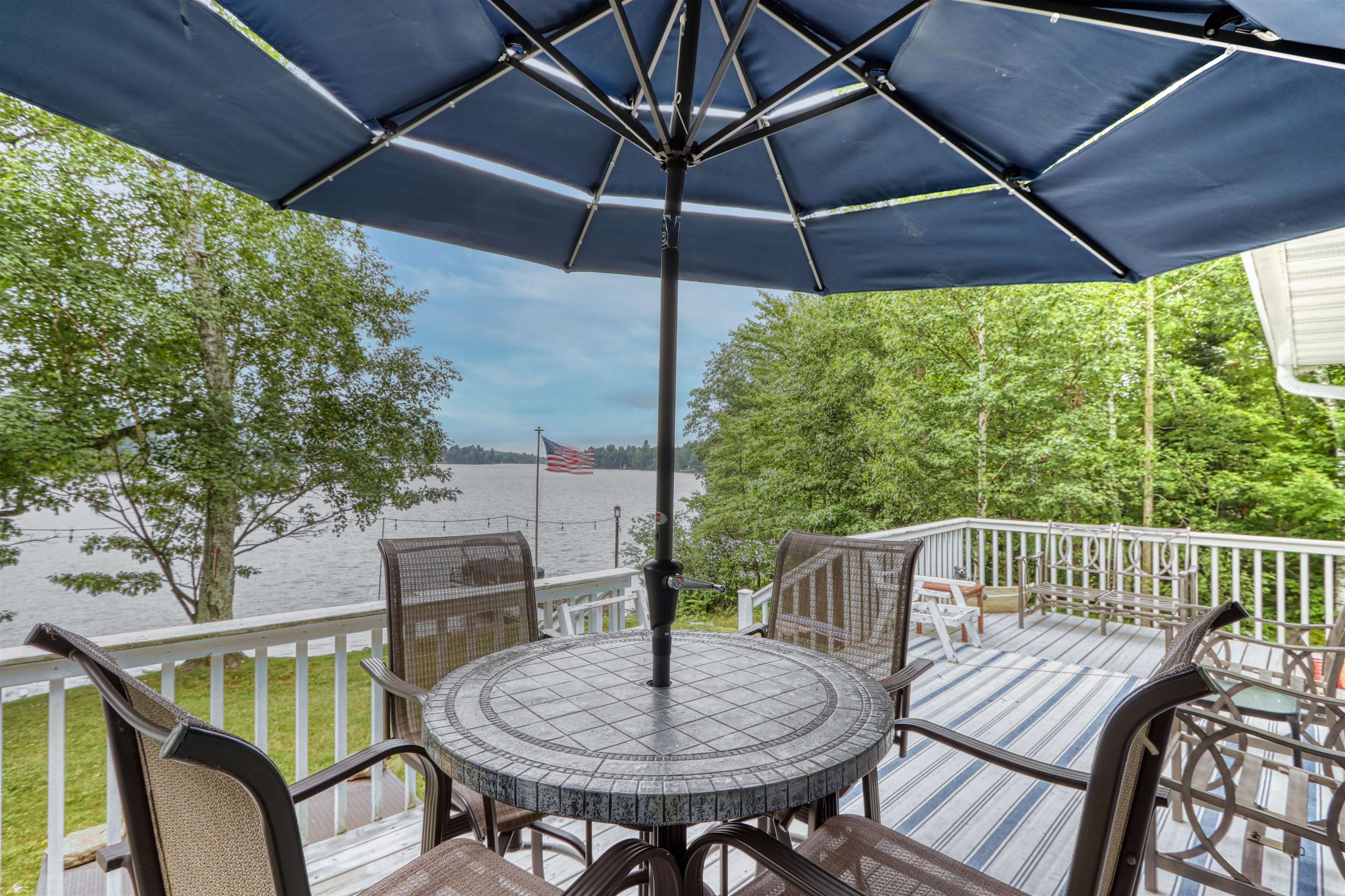 7144 Malm Road Winter, WI 54896 - Photo 54 of 58 Wooden deck with a water view and outdoor dining area