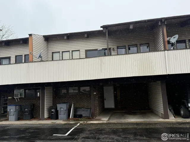 a front view of a building with glass windows