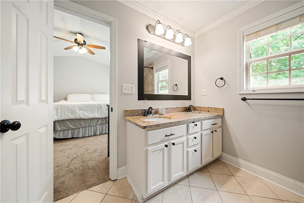 921 Pace Road Hiram, GA 30141 - Photo 20 of 41 a bathroom with a double vanity sink mirror and