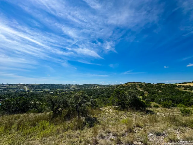 a view of a lake from a yard