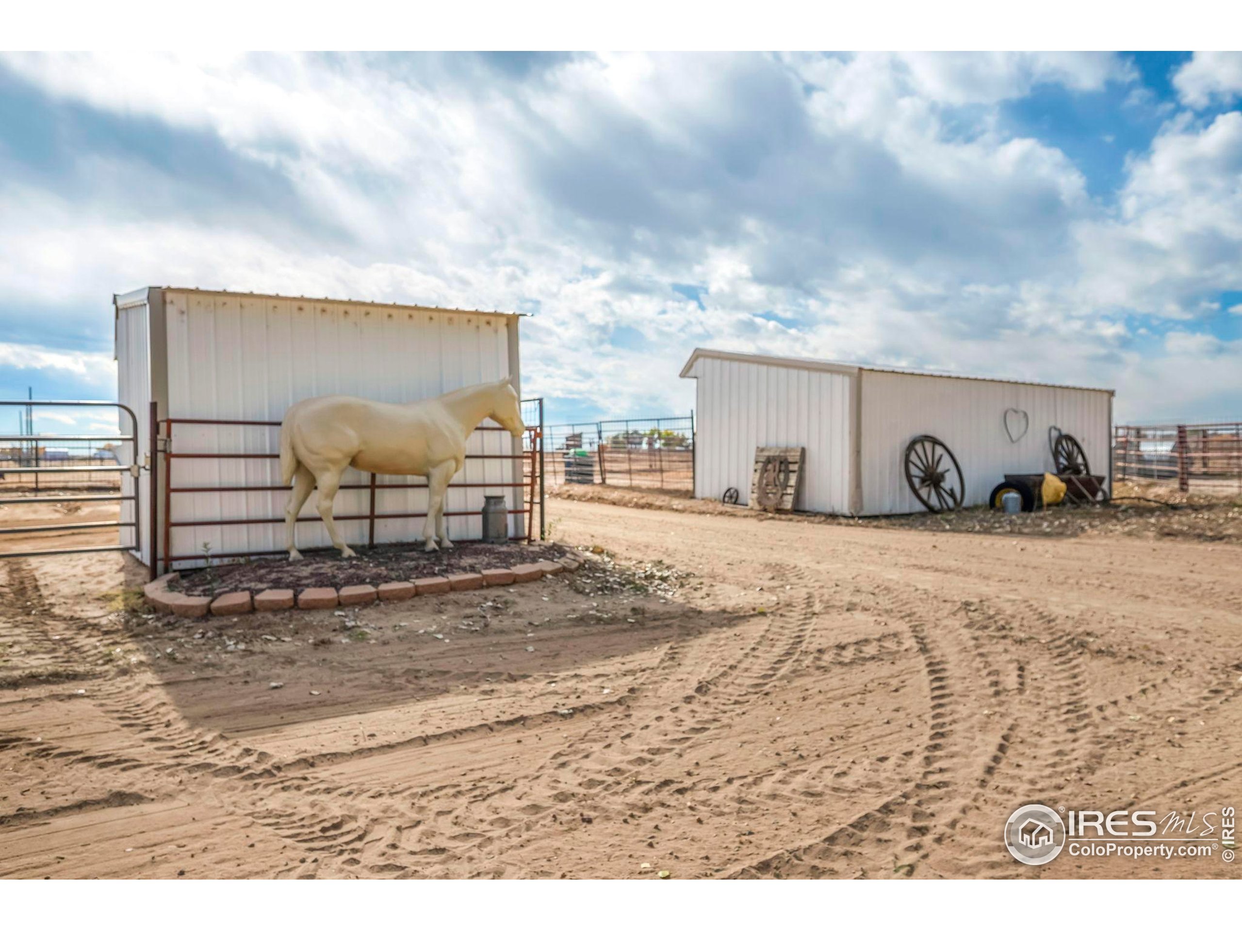 9875 County Road 24 Fort Lupton, CO 80621 - Photo 18 of 50 a view of a livingroom with wooden floor