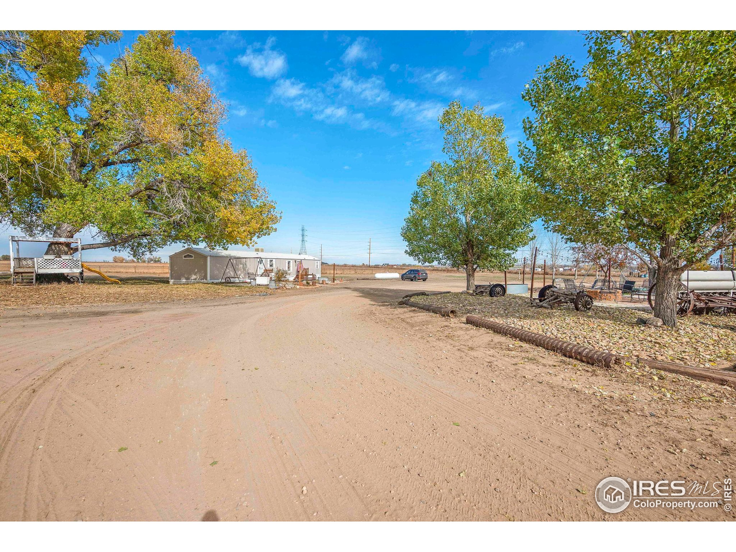 9875 County Road 24 Fort Lupton, CO 80621 - Photo 20 of 50 a view of street with houses