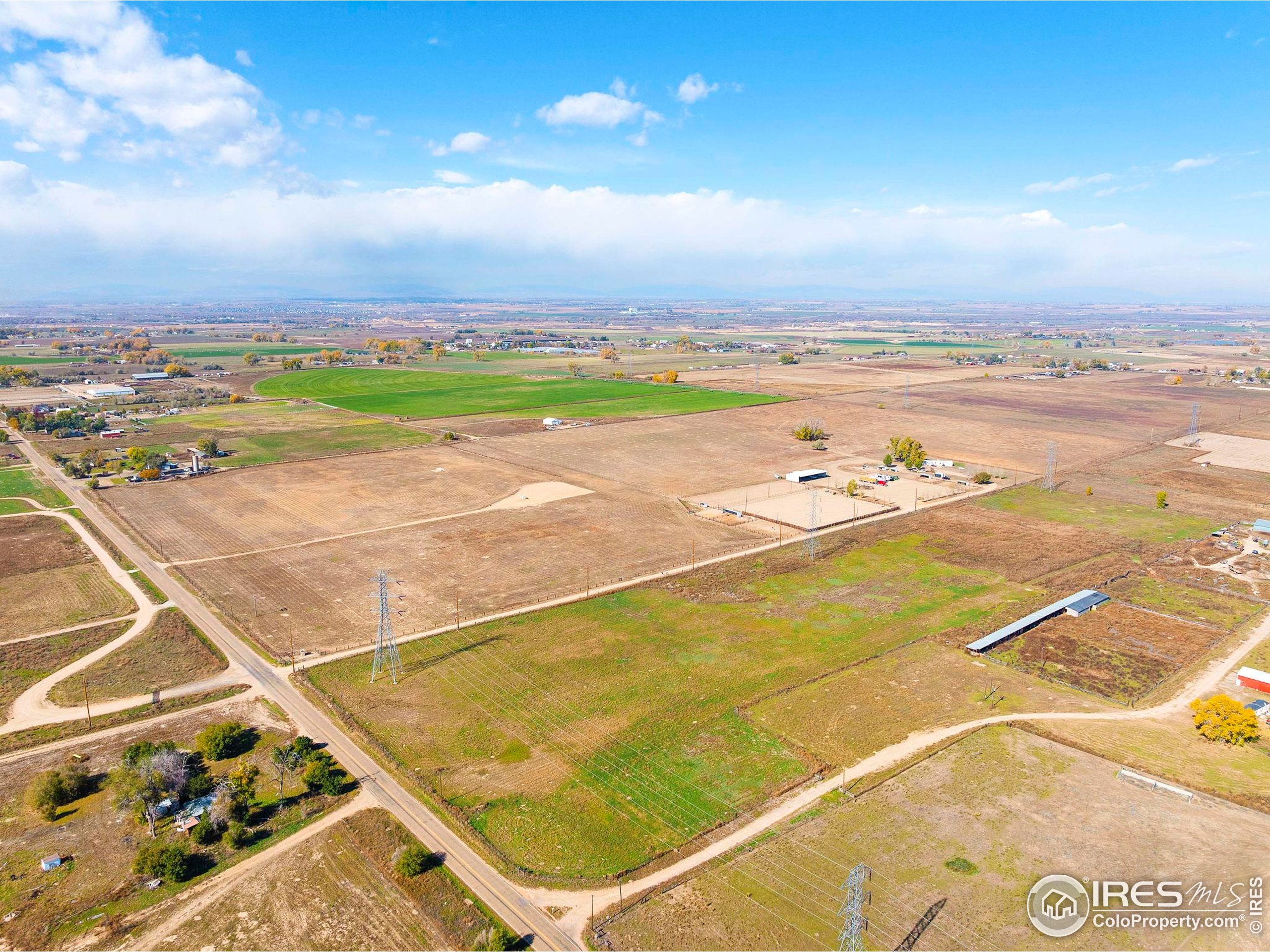 9875 County Road 24 Fort Lupton, CO 80621 - Photo 2 of 50 a view of an outdoor space and tennis court