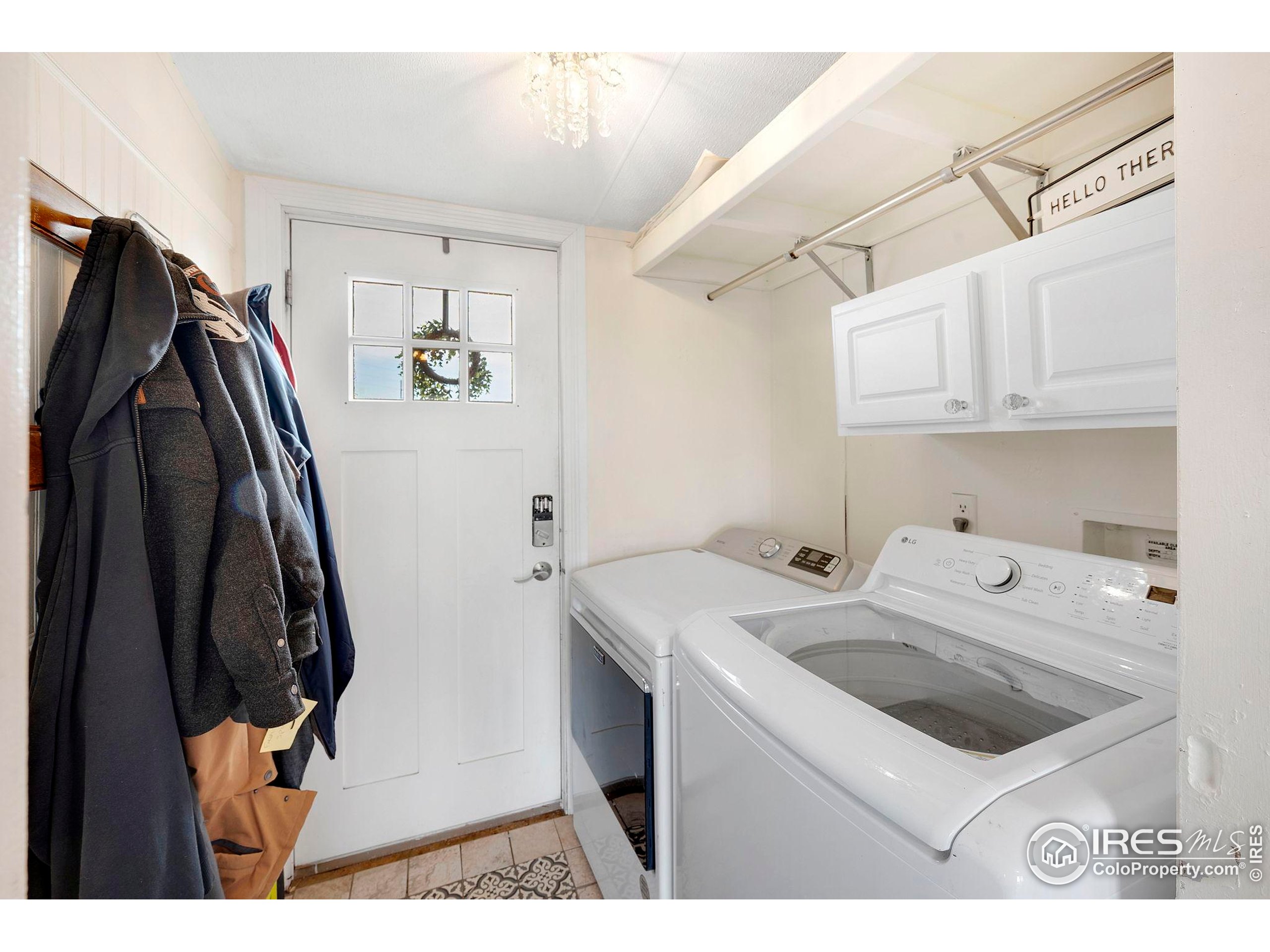 9875 County Road 24 Fort Lupton, CO 80621 - Photo 24 of 50 a utility room with dryer and washer