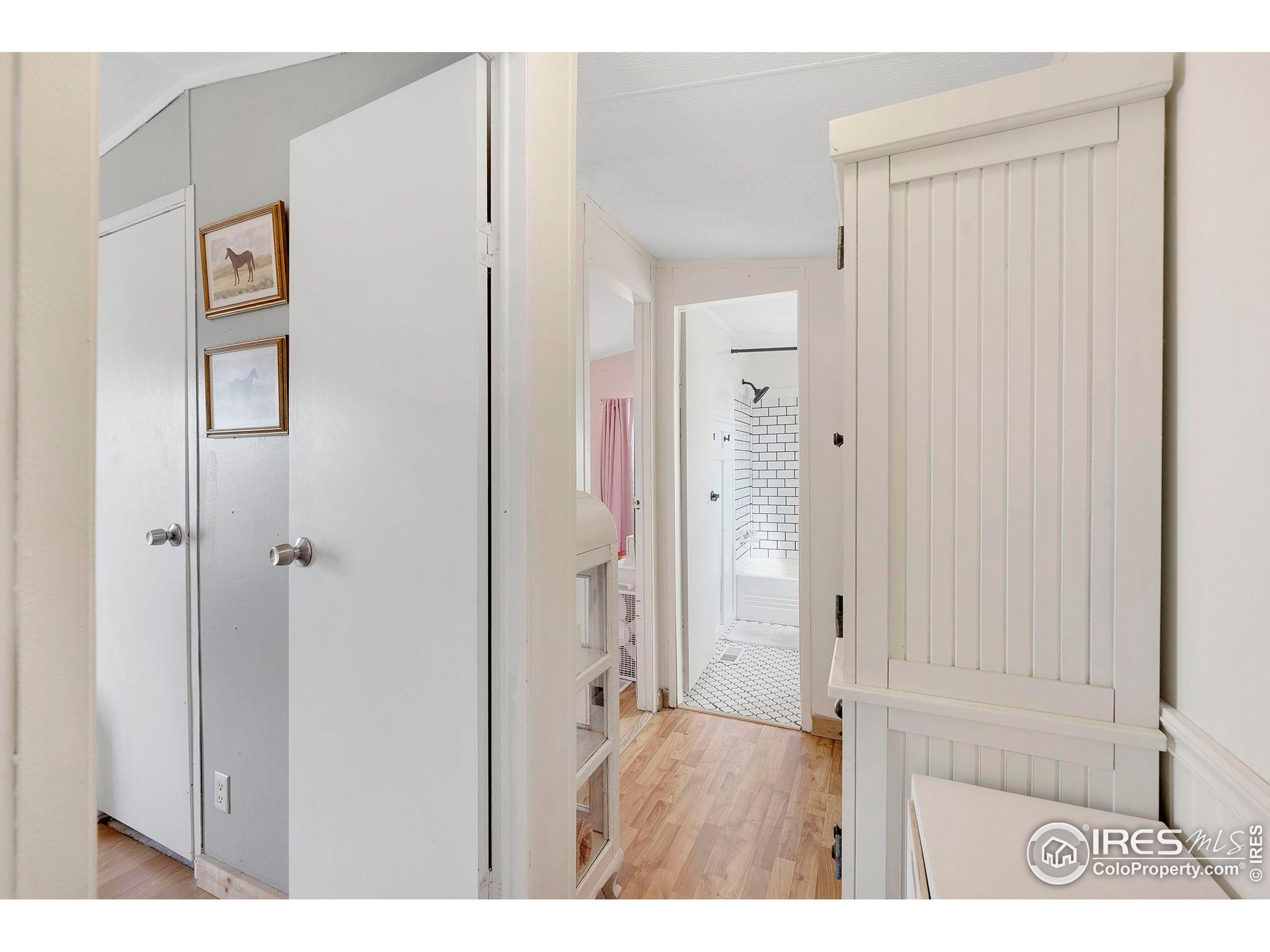 9875 County Road 24 Fort Lupton, CO 80621 - Photo 37 of 50 a view of an entryway with wooden floor