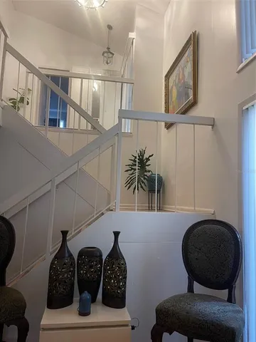 a view of entryway and workspace