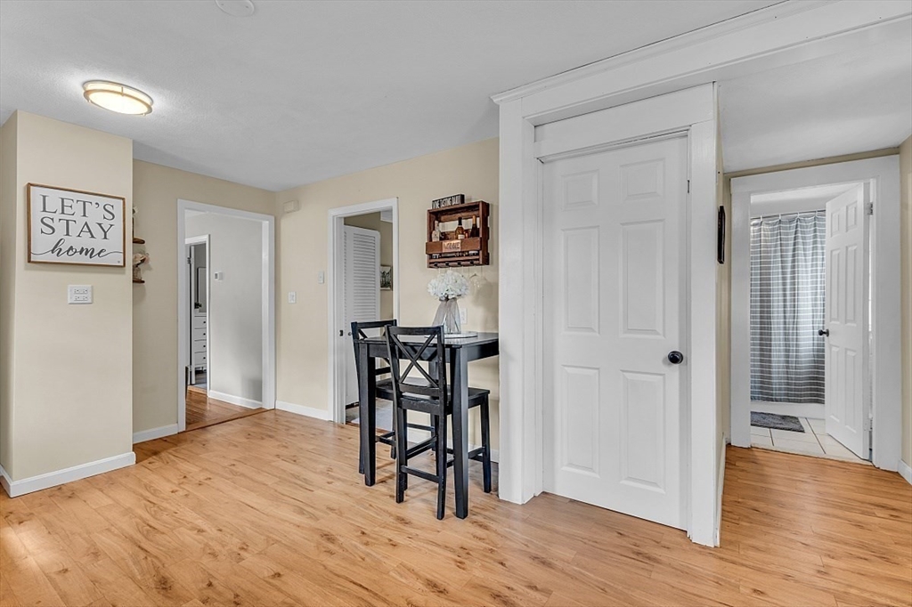 898 Boston Road Billerica, MA 01821 - Photo 11 of 38 a view of a livingroom with furniture and wooden floor