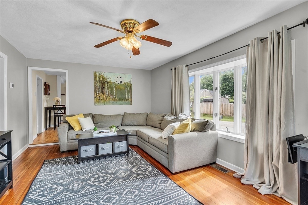 898 Boston Road Billerica, MA 01821 - Photo 21 of 38 a living room with furniture and a large window