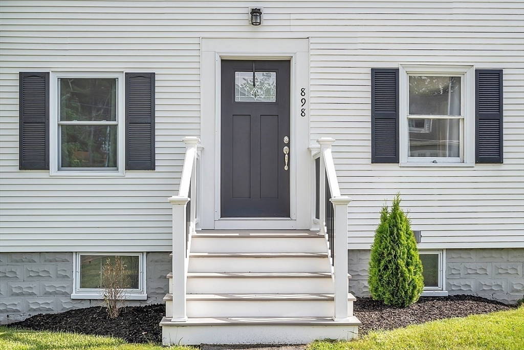898 Boston Road Billerica, MA 01821 - Photo 3 of 38 a view of a house with entryway and a window