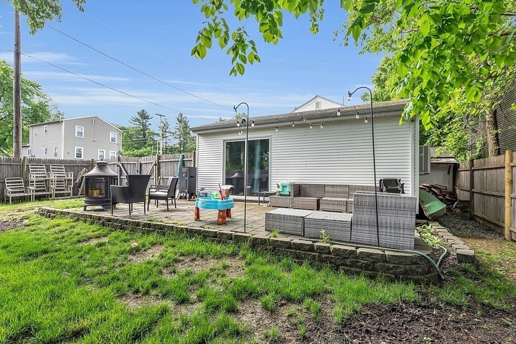 898 Boston Road Billerica, MA 01821 - Photo 32 of 38 a view of a backyard with a patio
