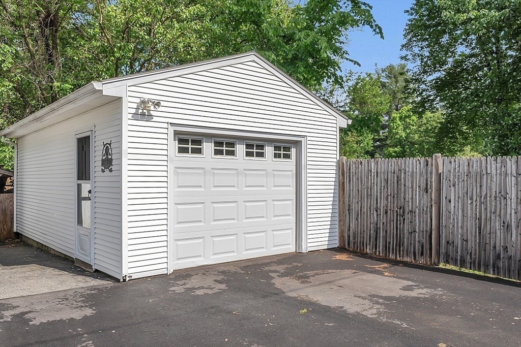 898 Boston Road Billerica, MA 01821 - Photo 35 of 38 a view of a white house with a large space in front of it