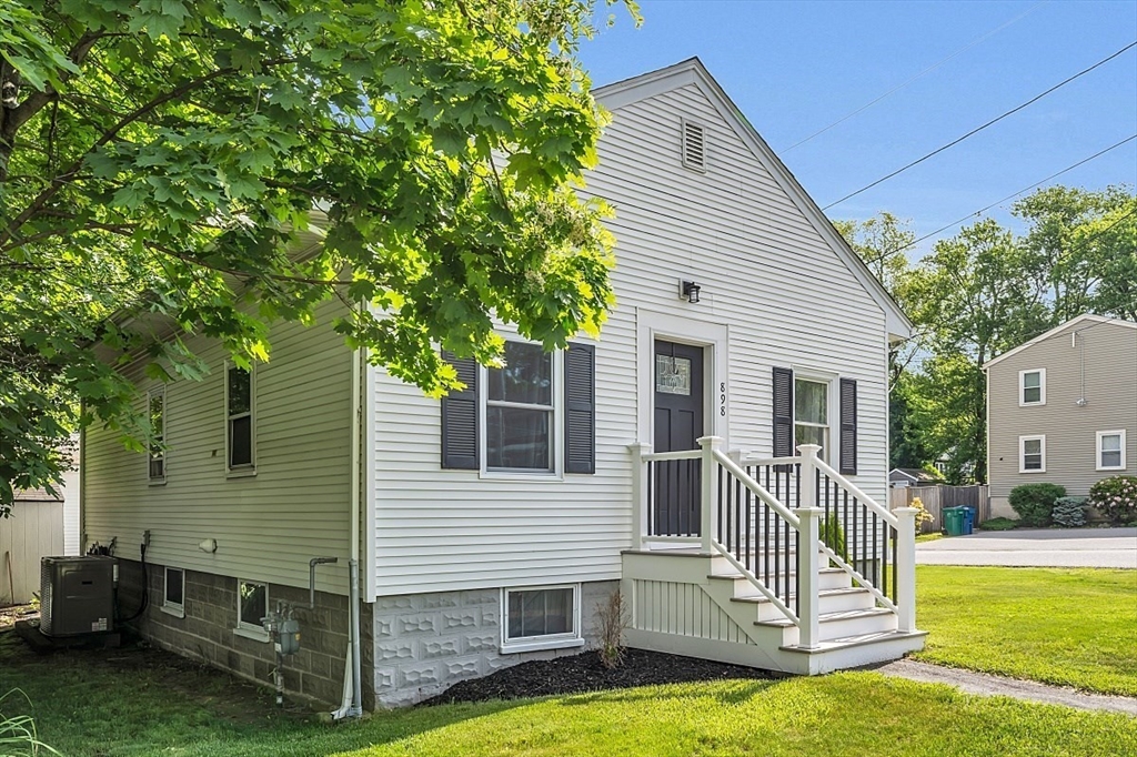 898 Boston Road Billerica, MA 01821 - Photo 38 of 38 a view of a house with a yard and sitting area