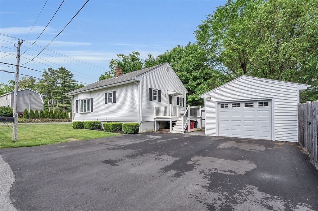 898 Boston Road Billerica, MA 01821 - Photo 4 of 38 a view of a house with a yard and large tree