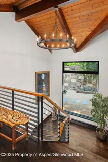 a bathroom with a granite countertop sink mirror and vanity
