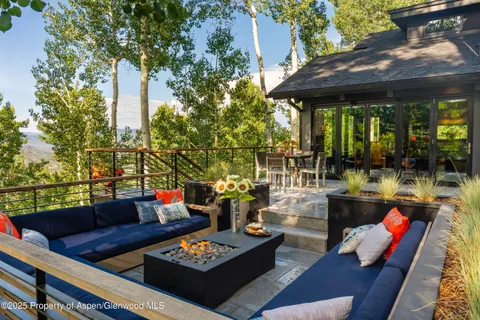 a view of outdoor sitting area with furniture