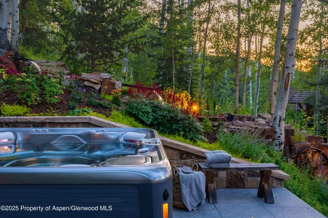 a view of a yard with a patio