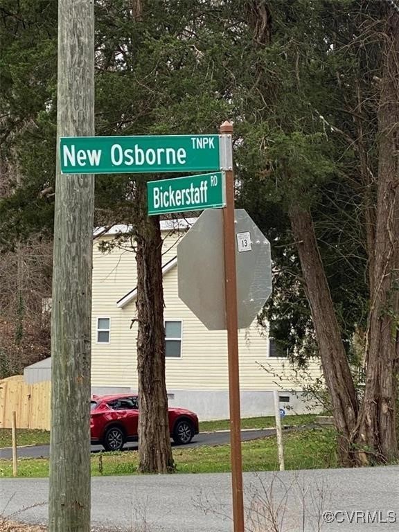 980-990 Bickerstaff Road Richmond, VA 23231 - Photo 9 of 9 a sign that is on the side of a road