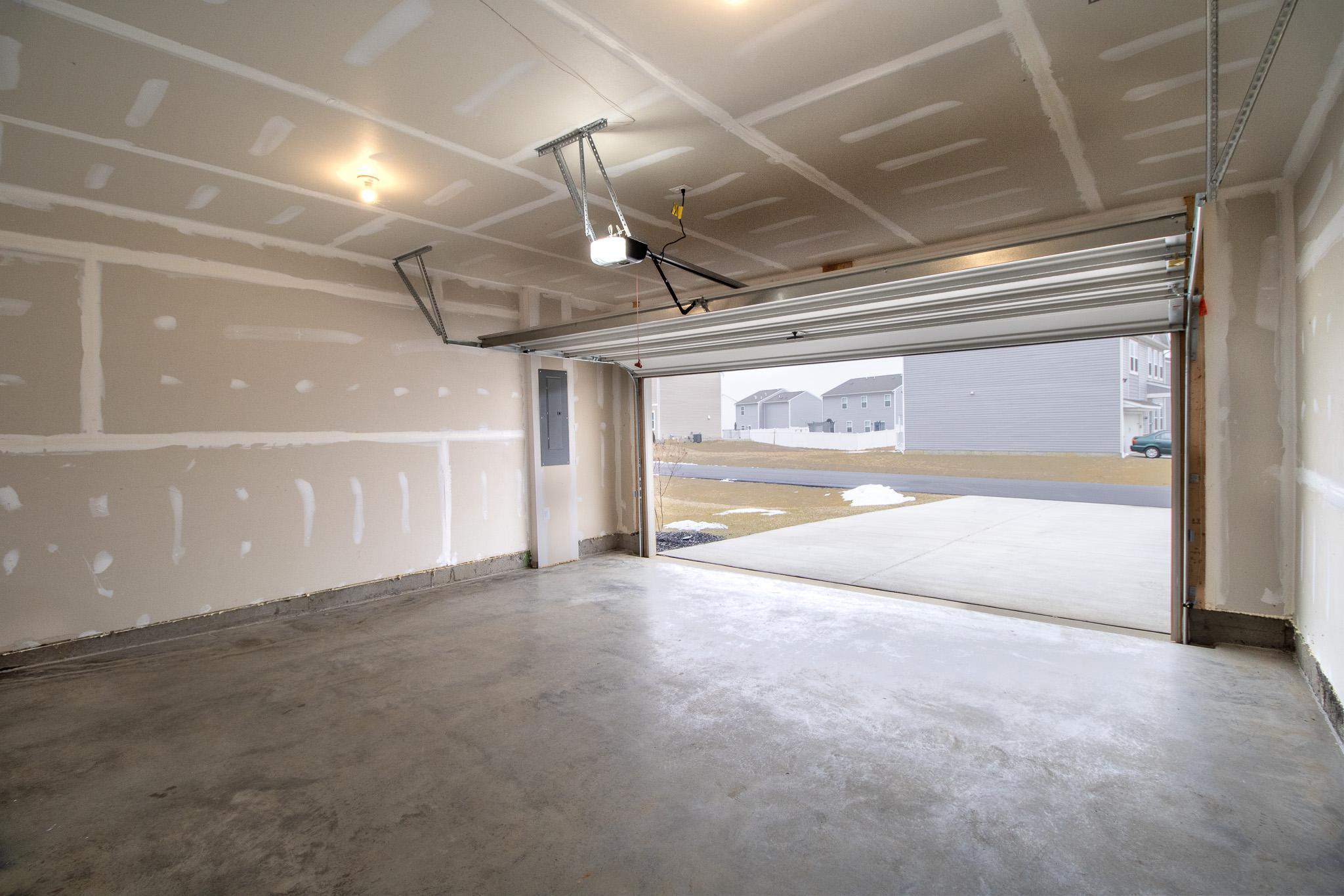 154 Diving Scaup Road Hedgesville, WV 25427 - Photo 54 of 63 Spacious garage with natural light.