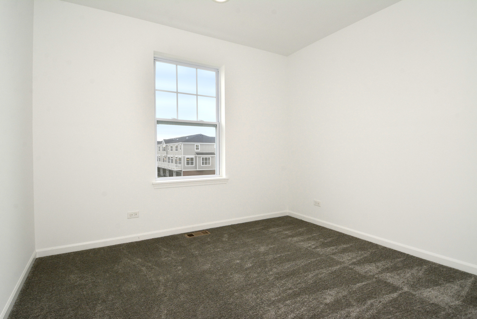 309 Timberleaf Circle Roselle, IL 60172 - Photo 13 of 16 an empty room with a window