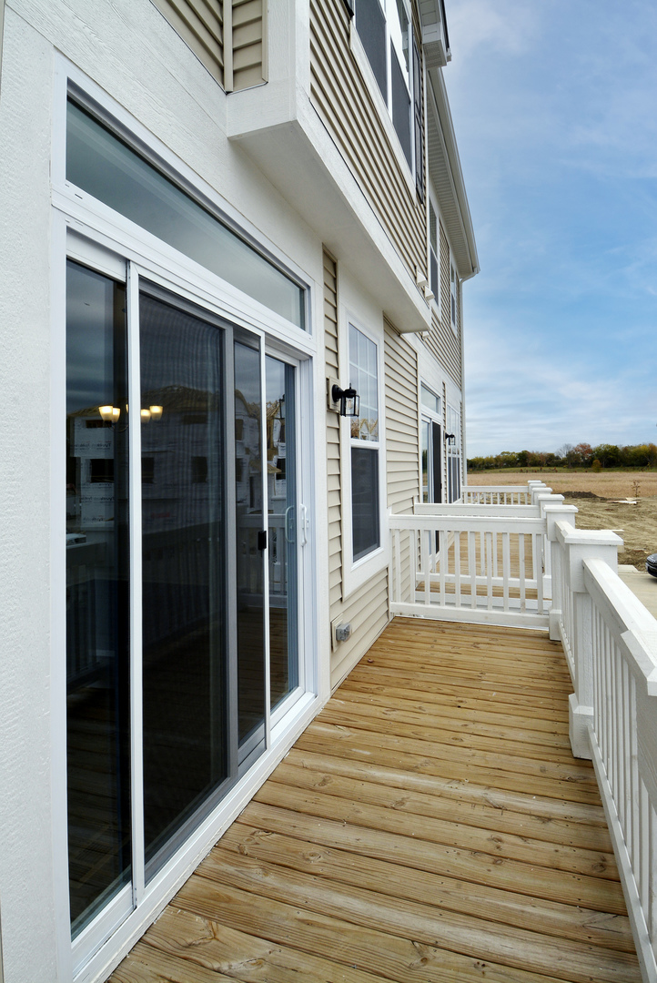 309 Timberleaf Circle Roselle, IL 60172 - Photo 16 of 16 a view of a balcony with wooden floor