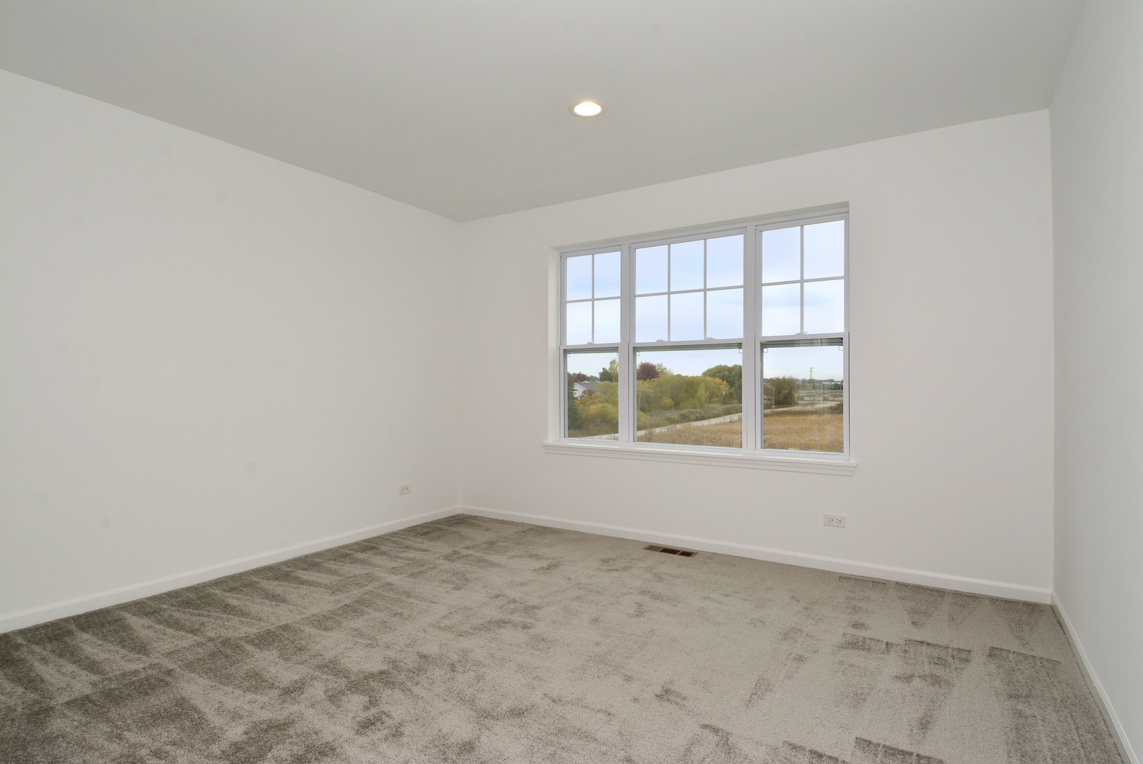 309 Timberleaf Circle Roselle, IL 60172 - Photo 10 of 16 an empty room with a window