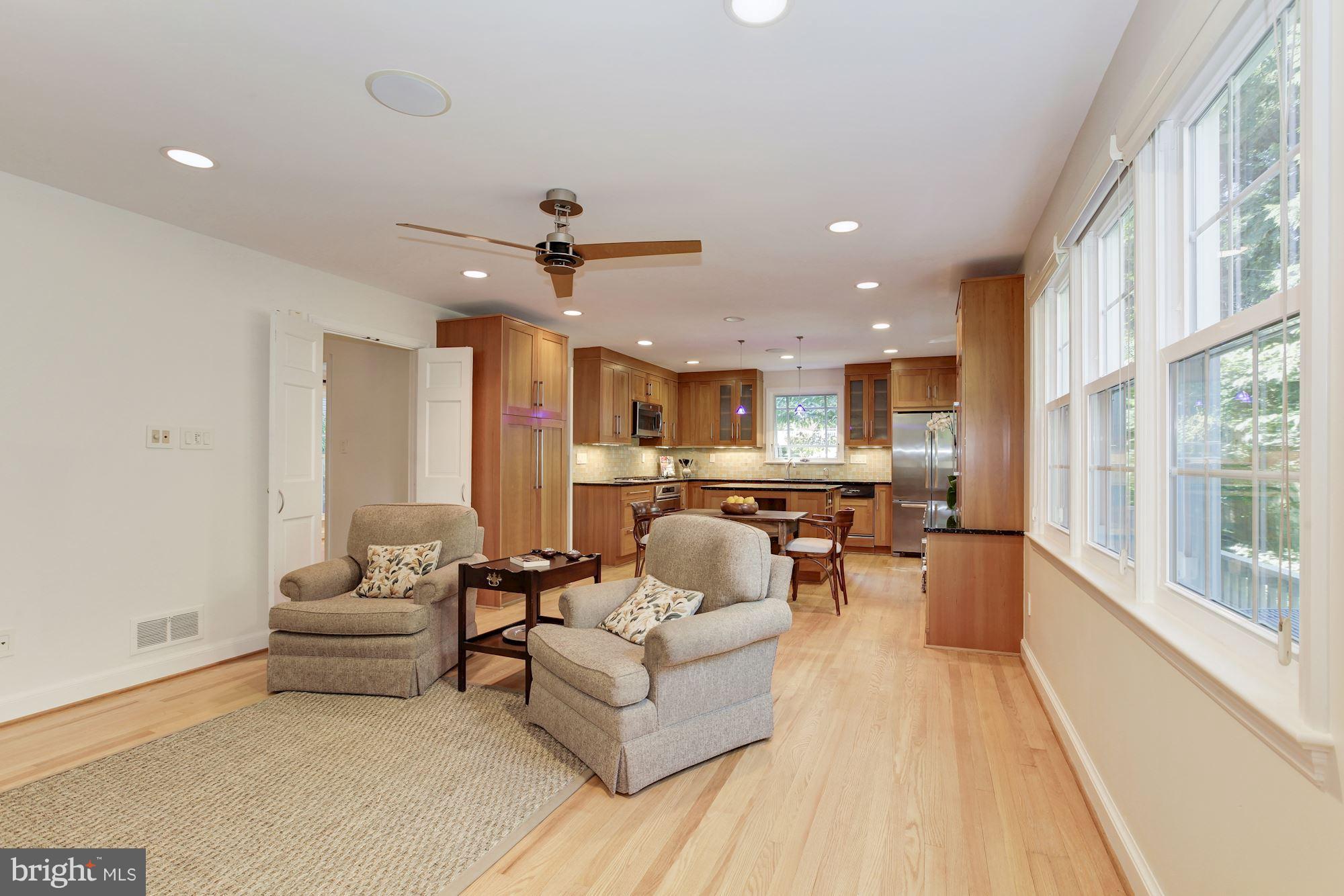 5509 Center Street Chevy Chase, MD 20815 - Photo 11 of 30 a living room with furniture and a large window