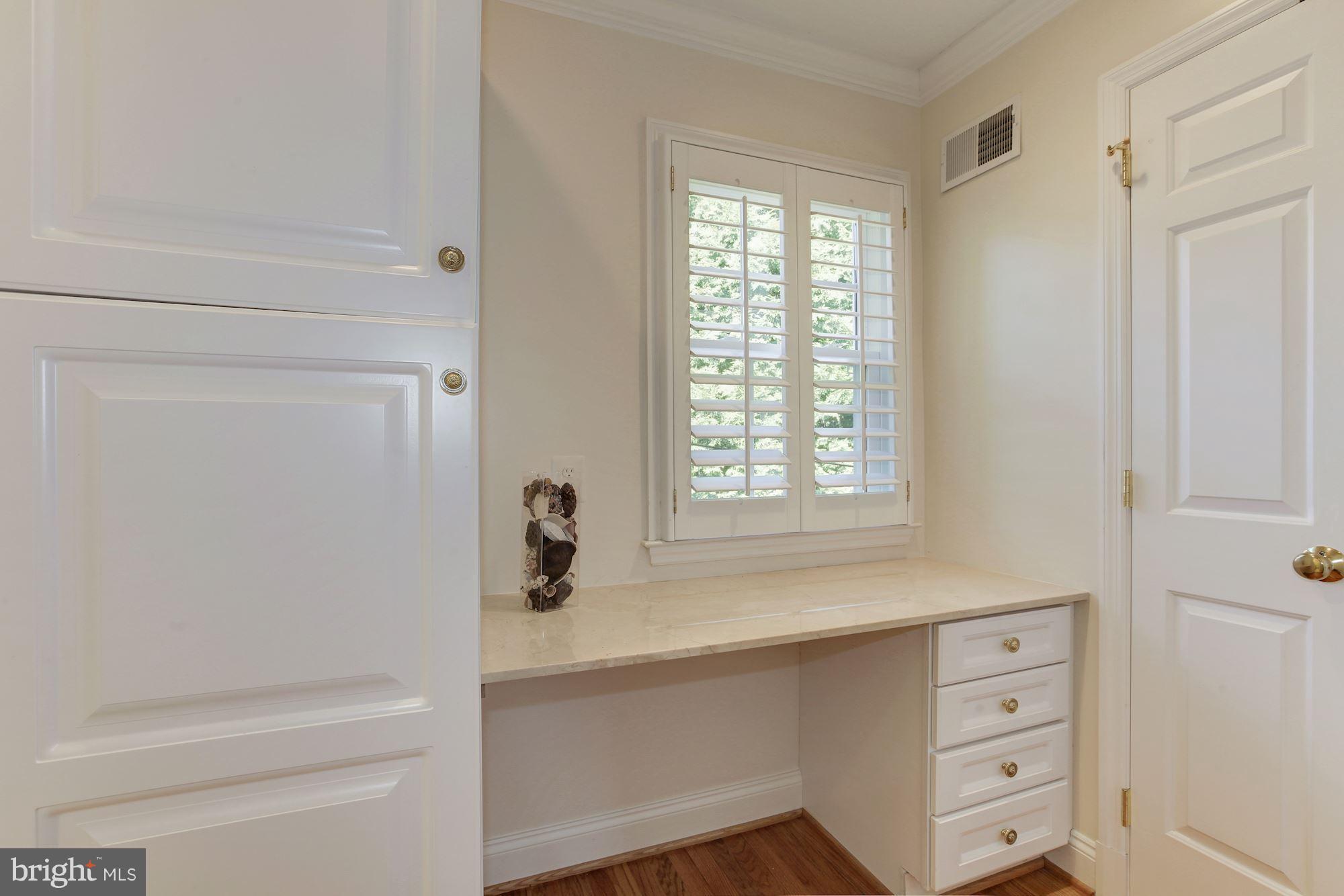 5509 Center Street Chevy Chase, MD 20815 - Photo 16 of 30 a bathroom with a bathtub and shower