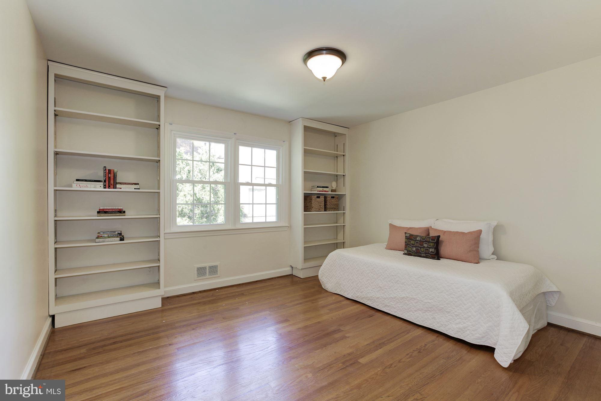 5509 Center Street Chevy Chase, MD 20815 - Photo 21 of 30 a bedroom with a bed and a window