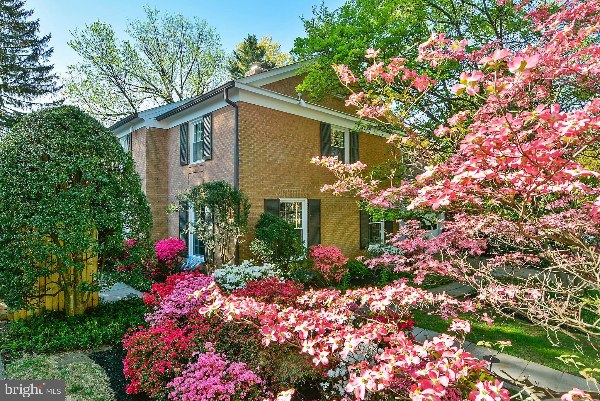 5509 Center Street Chevy Chase, MD 20815 - Photo 25 of 30 a view of a house with a yard and garden