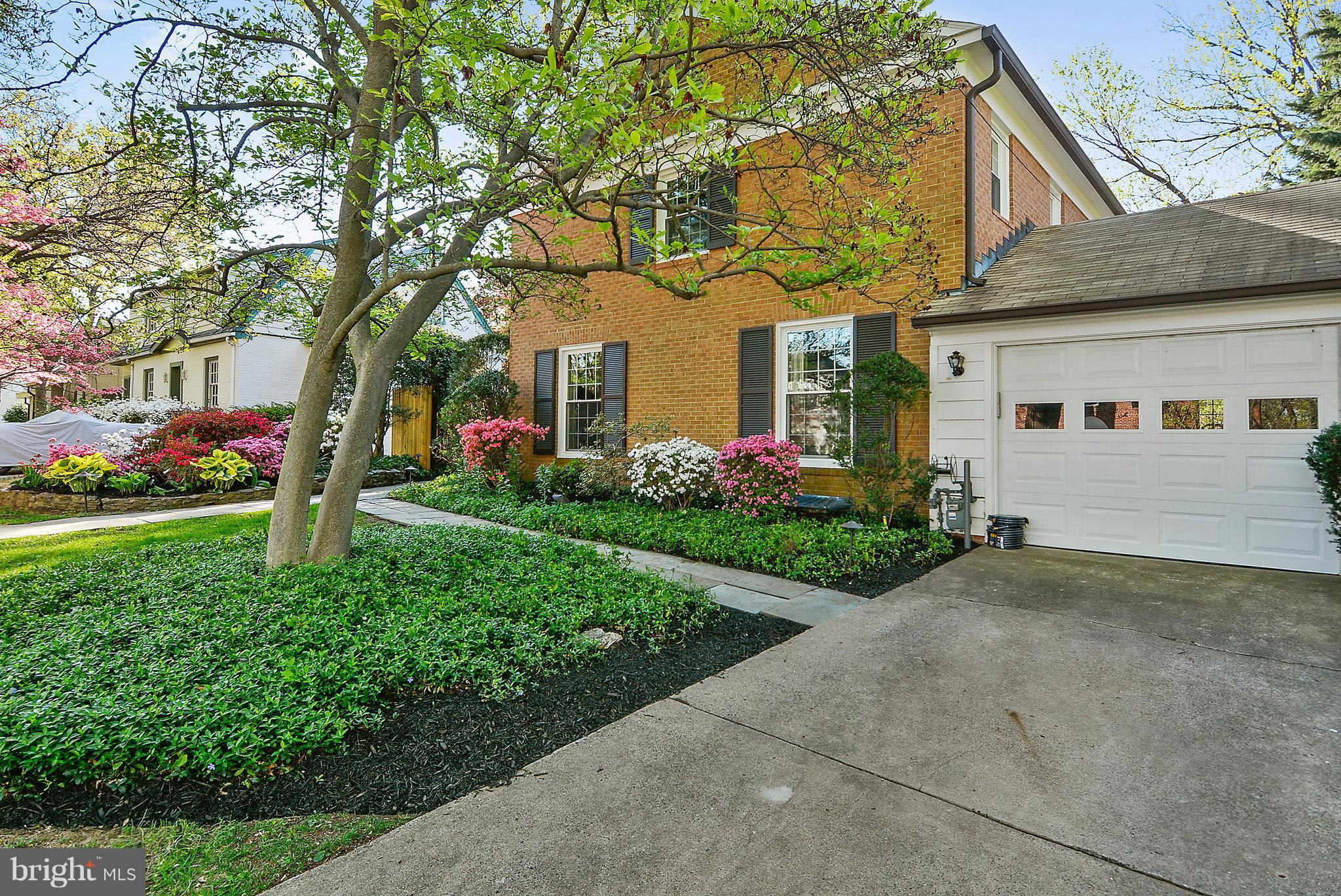 5509 Center Street Chevy Chase, MD 20815 - Photo 30 of 30 a front view of a house with garden
