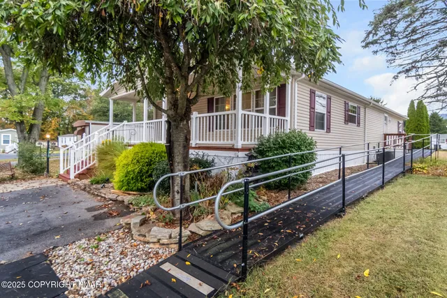 a house view with a garden space