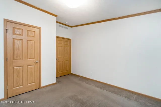 a bathroom with a sink granite toilet tub and shower