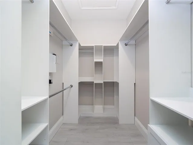 a utility room with sink dryer and washer
