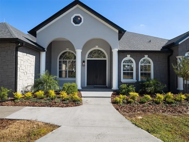 a view of a kitchen and dining room