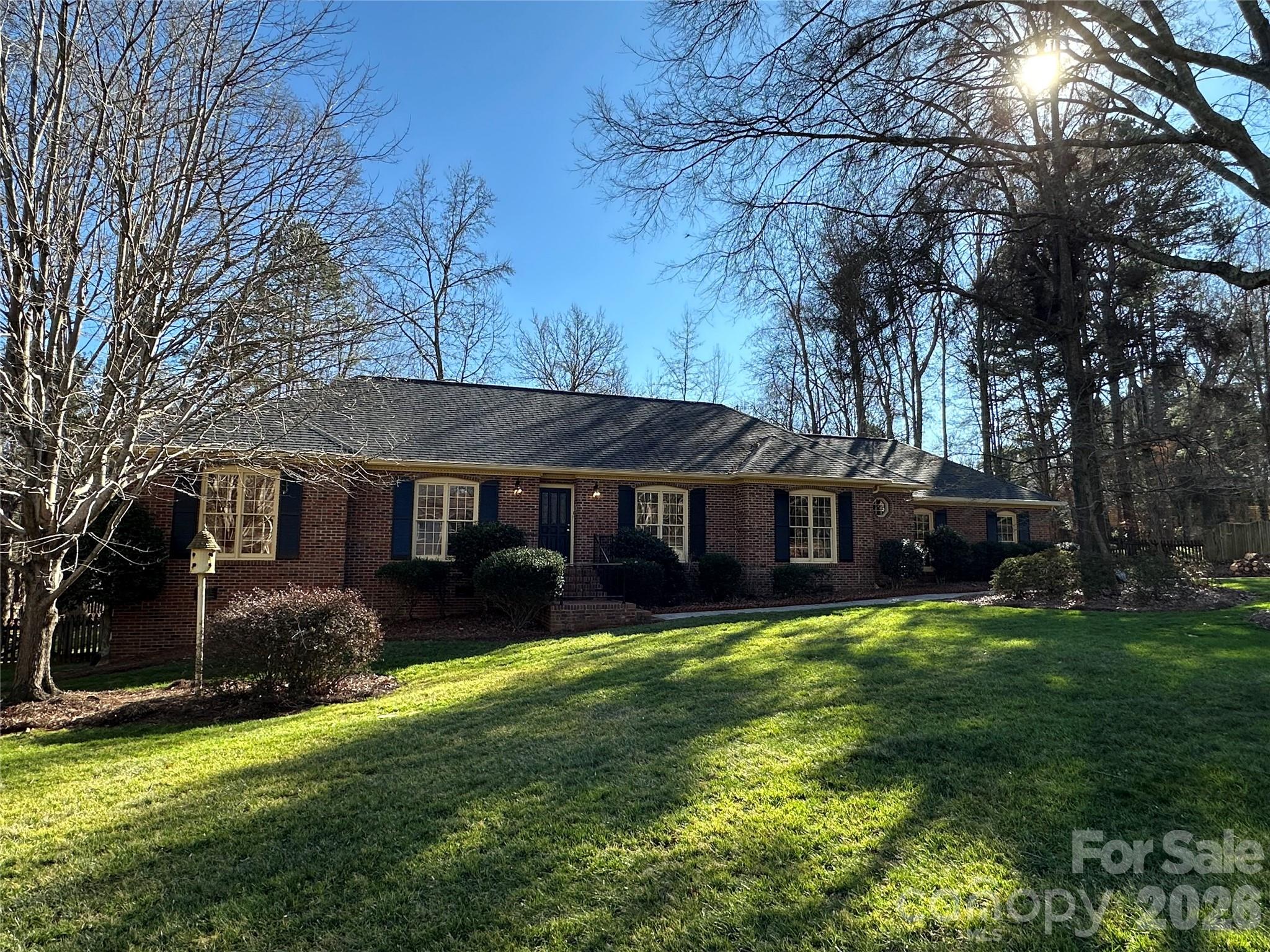 5143 Mintridge Road Mint Hill, NC 28227 - Photo 1 of 35 a view of a house with a yard and large tree