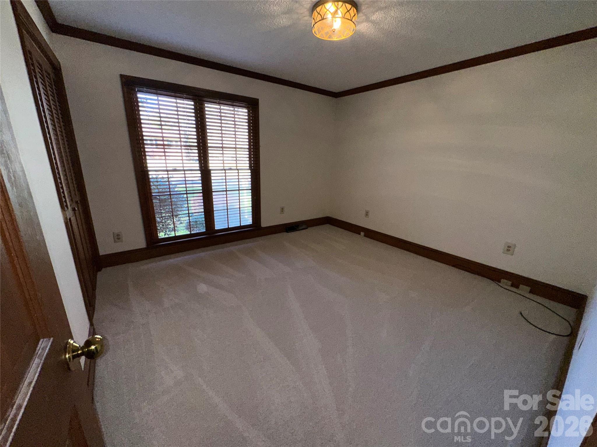 5143 Mintridge Road Mint Hill, NC 28227 - Photo 16 of 35 an empty room with a window