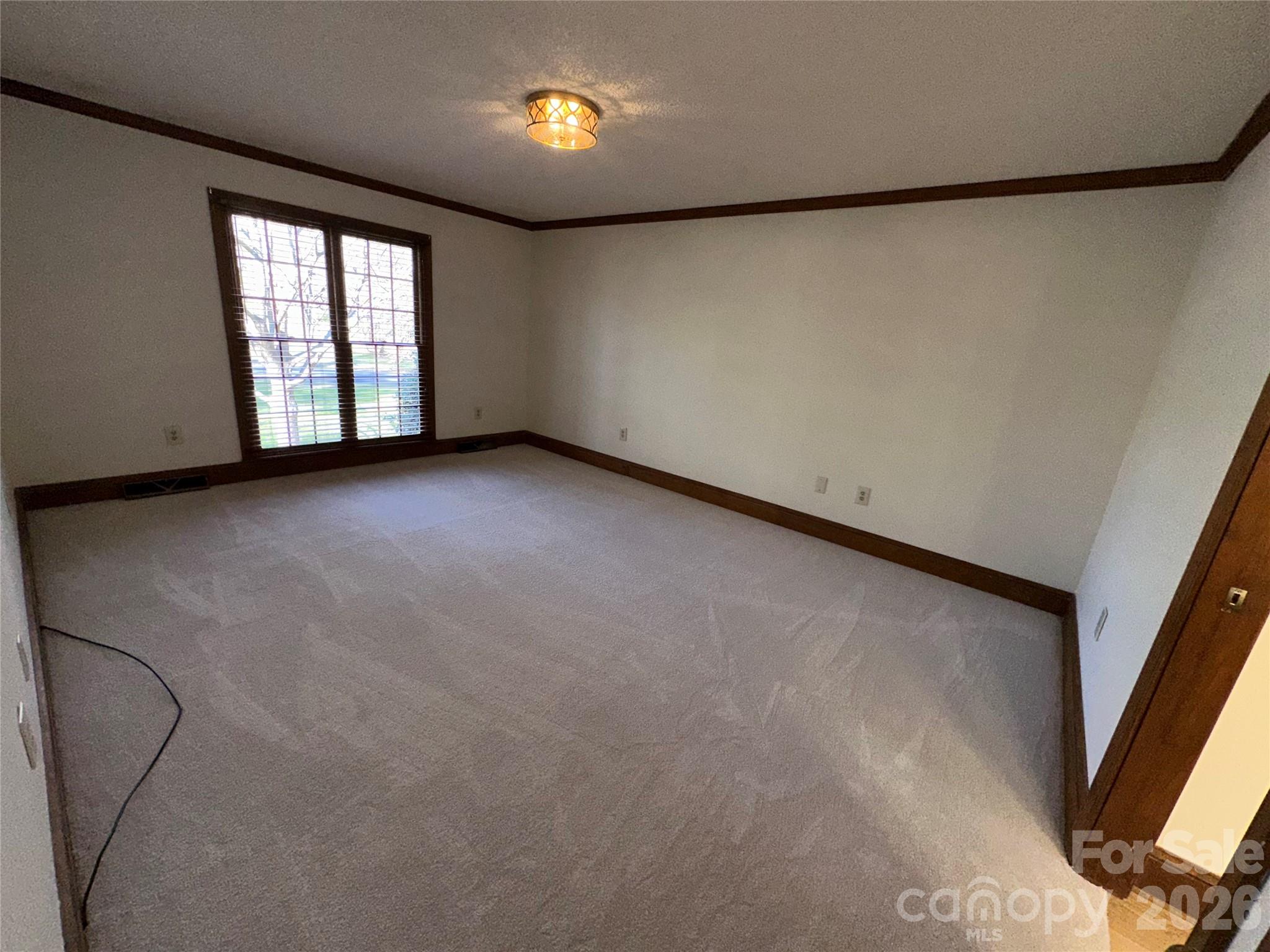 5143 Mintridge Road Mint Hill, NC 28227 - Photo 17 of 35 an empty room with windows