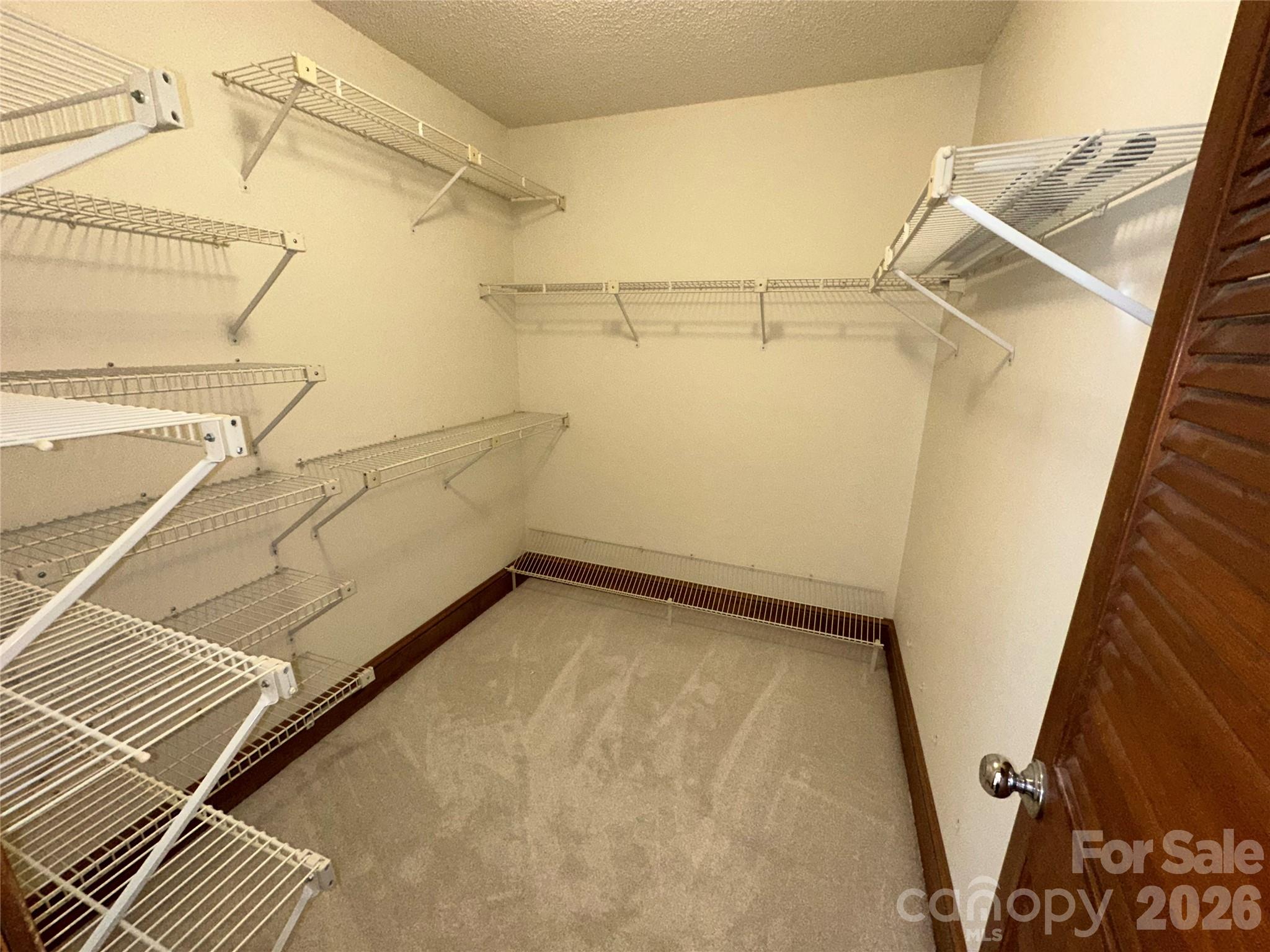 5143 Mintridge Road Mint Hill, NC 28227 - Photo 21 of 35 a view of a room with racks on the wall