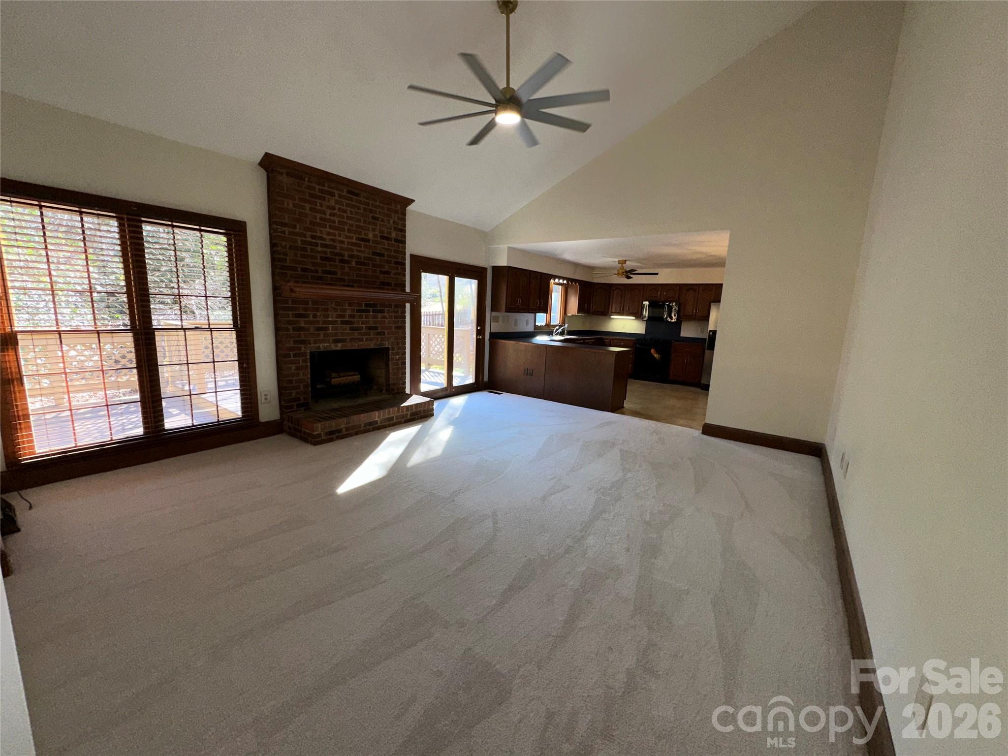 5143 Mintridge Road Mint Hill, NC 28227 - Photo 6 of 35 a view of a livingroom with a fireplace and window