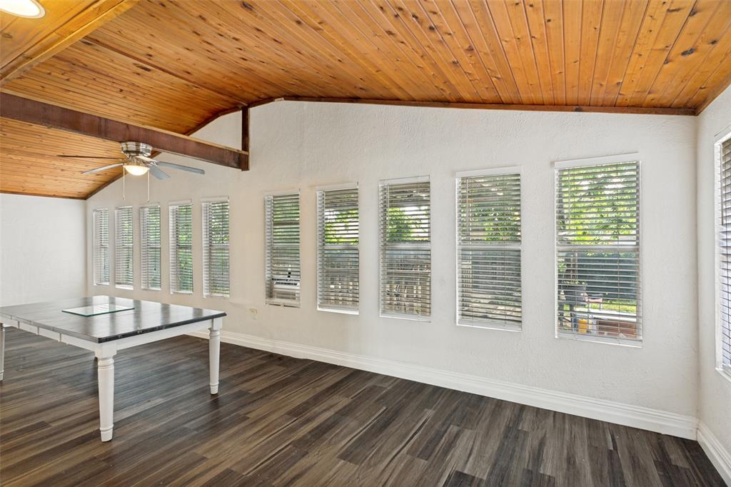1904 Old Kirk Road Bedford, TX 76022 - Photo 15 of 25 a view of a livingroom with wooden floor and furniture
