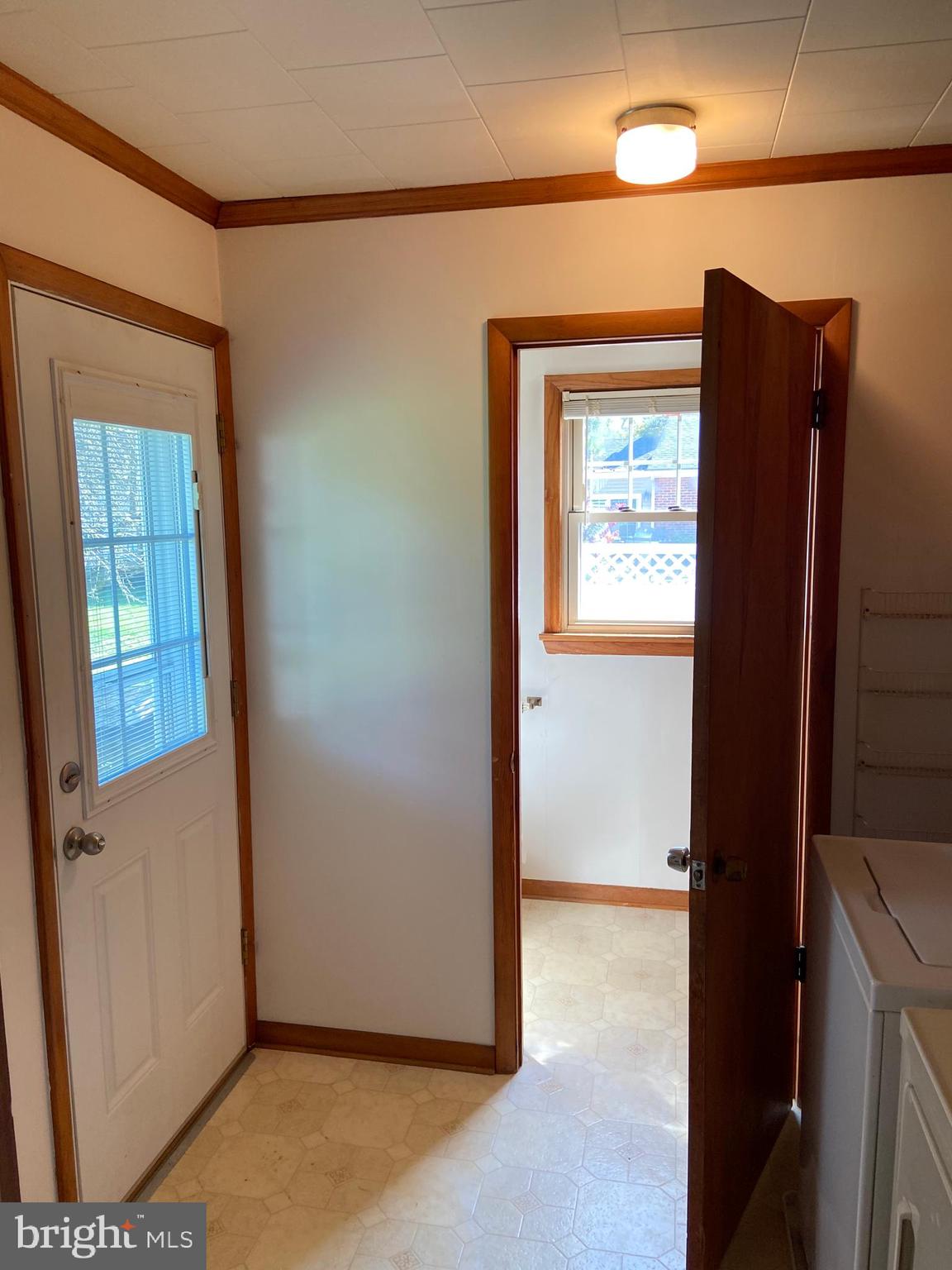 104 Killarney Road Cambridge, MD 21613 - Photo 5 of 38 Rear door entrance with Half Bath