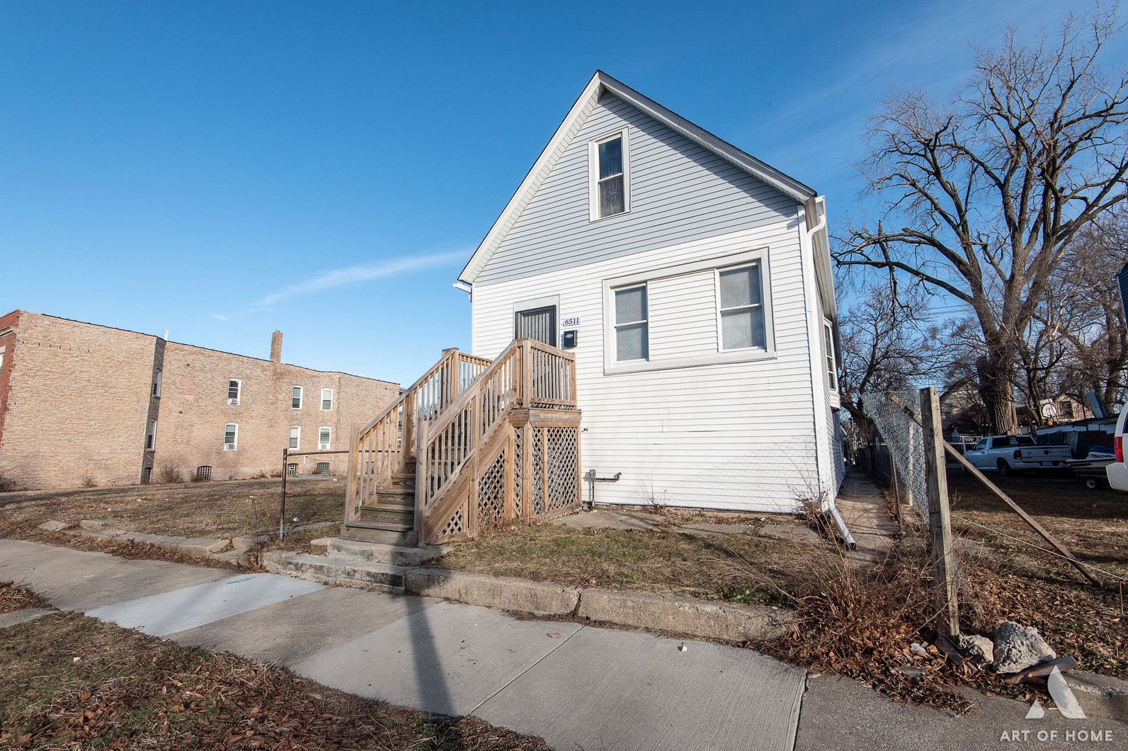 6511 South Justine Street Chicago, IL 60636 - Photo 21 of 28 a view of a house with a yard