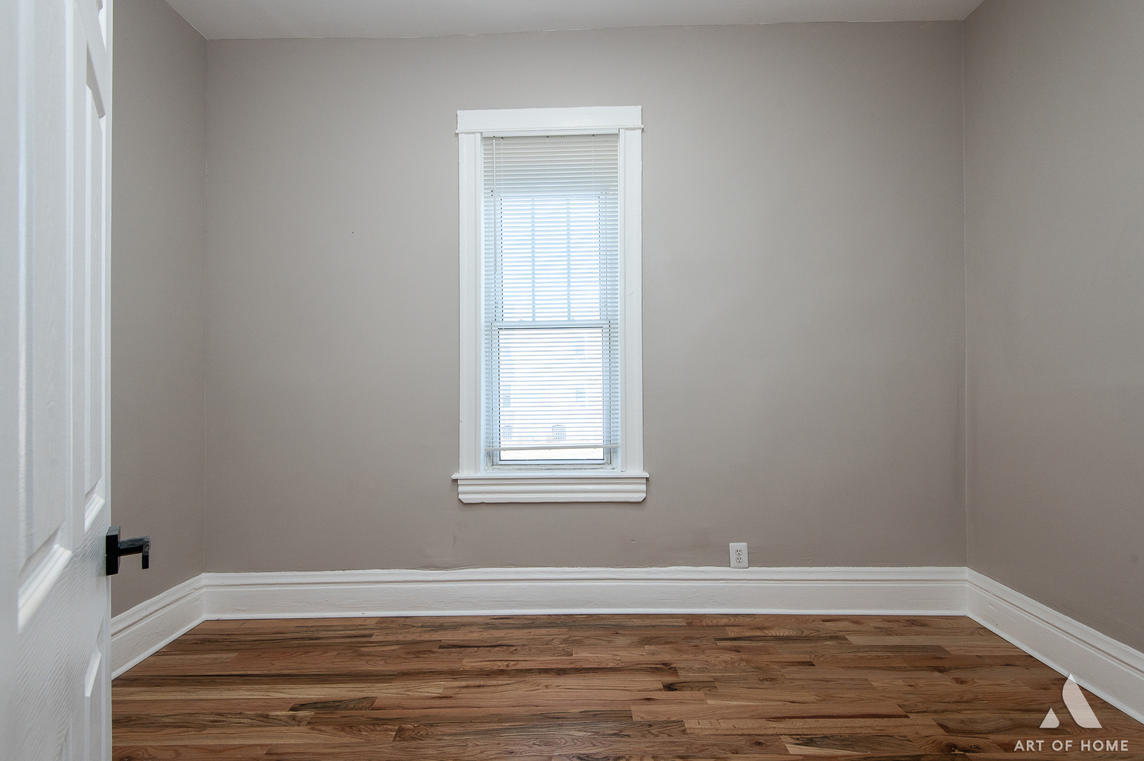 6511 South Justine Street Chicago, IL 60636 - Photo 24 of 28 a view of an empty room with wooden floor and a window