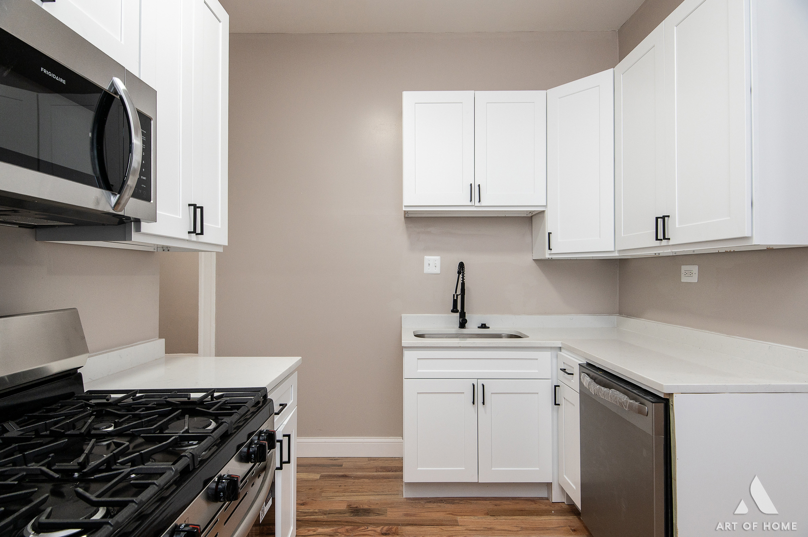 6511 South Justine Street Chicago, IL 60636 - Photo 6 of 28 a kitchen with white cabinets and appliances